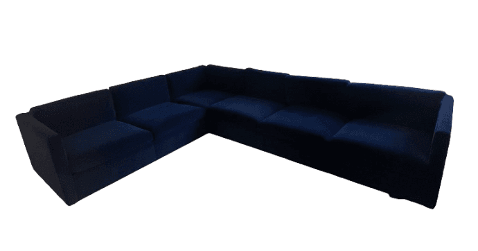 A dark blue, multi-seat sectional sofa with a low profile and blocky arms. It appears to be upholste… — 3D model