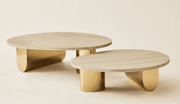 A set of two coffee tables with organic, rounded, elliptical tabletops. The tabletops have a light w… — 3D model
