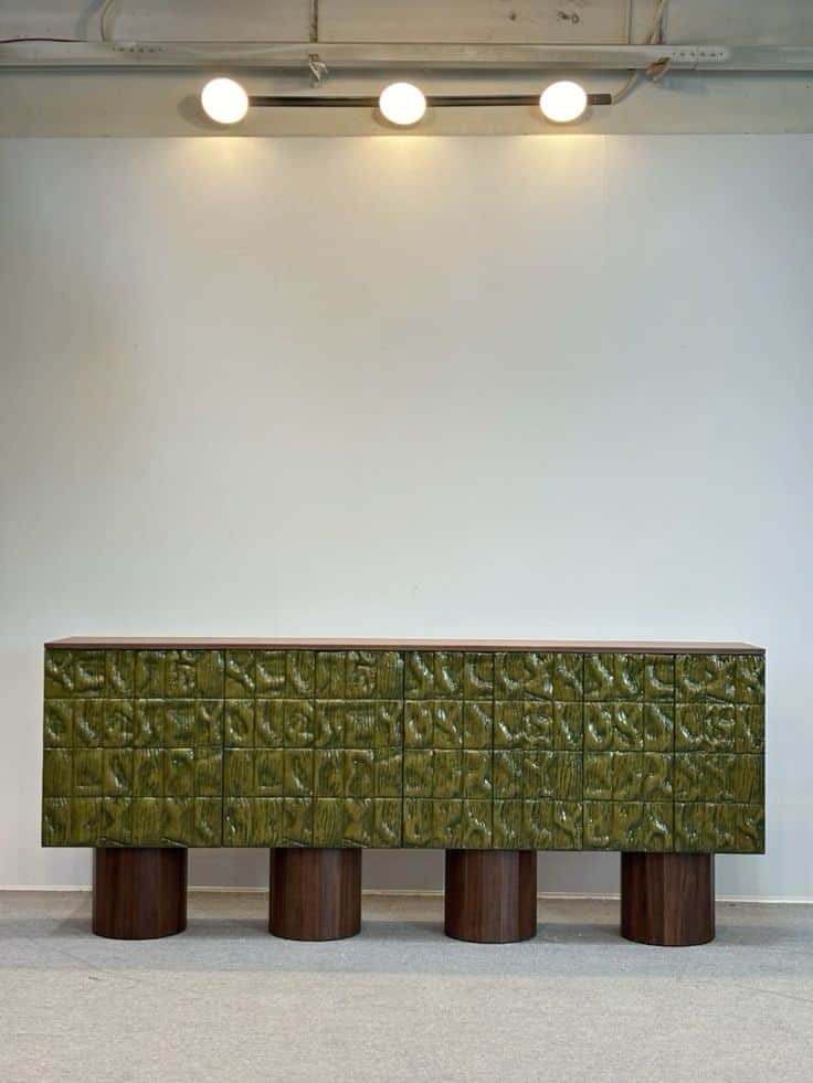 A long, low-profile credenza featuring a dark wood grain finish on its top and side panels, contrast… — 3D model