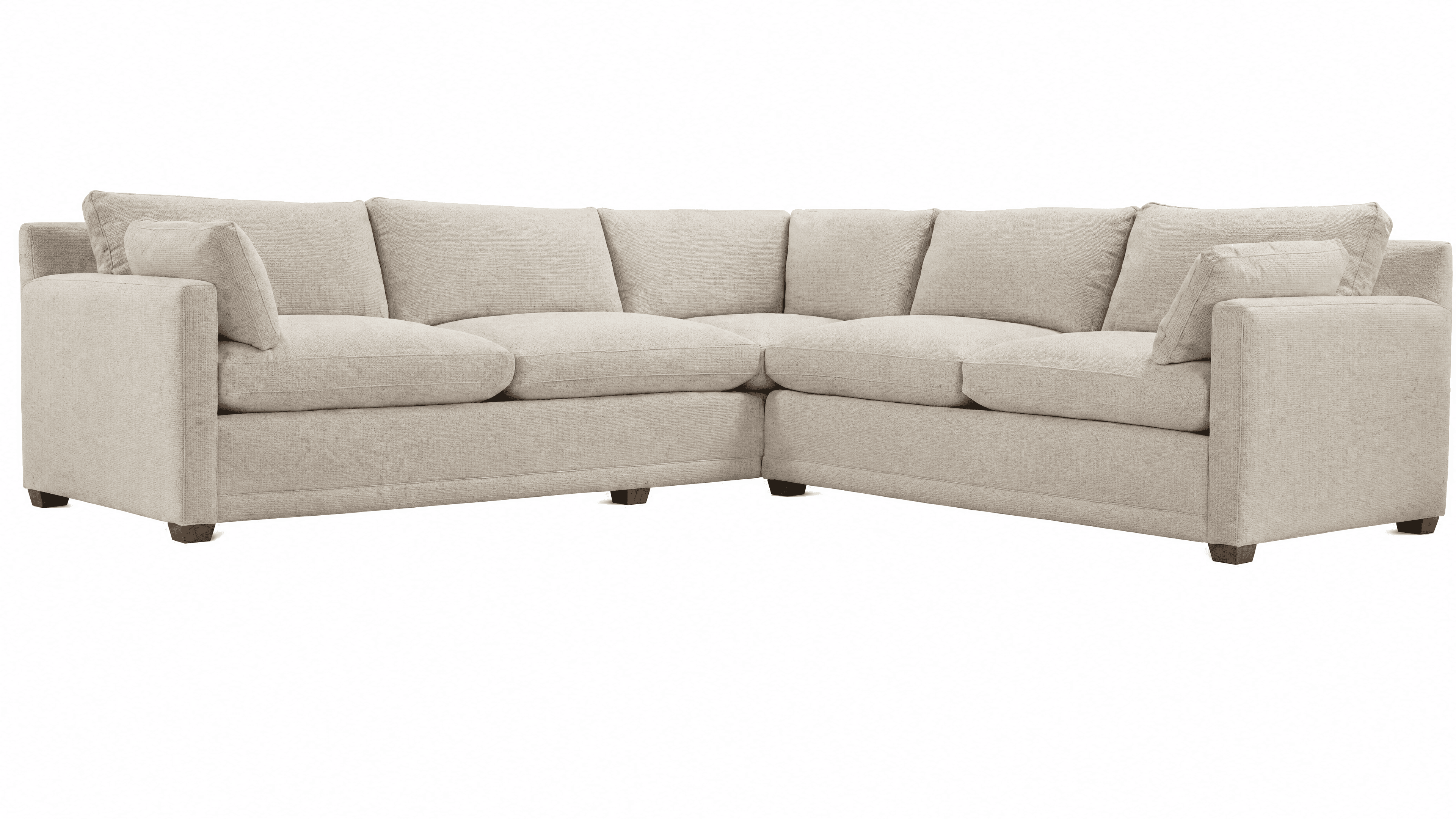 An L-shaped upholstered sectional sofa featuring a neutral light beige fabric, plush seat and back cushions, and low-profile wooden block feet. It is designed for multi-person seating and has broad, square-profile armrests. — 3D model