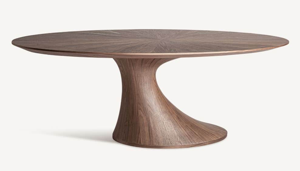 A modern dining table with a distinctive sculptural pedestal base. The tabletop is oval and features… — free GLB 3D model