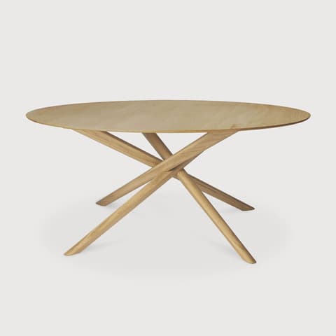 An oval dining table with a light wood finish and a sculptural base composed of intersecting wooden legs. — 3D model