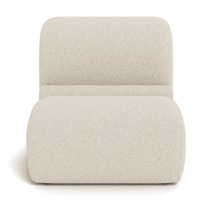 A modern armchair with a low profile and rounded edges, upholstered in a textured fabric. It feature… — 3D model