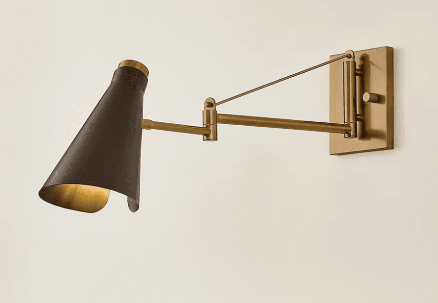A sophisticated wall-mounted light fixture featuring an articulating swing arm and a distinctive conical shade. The body and mounting plate are crafted from brass with a brushed finish, while the shade has a matte dark brown exterior and a reflective brass interior. The arm allows for adjustable illumination, making it suitable for task or accent lighting. — 3D model