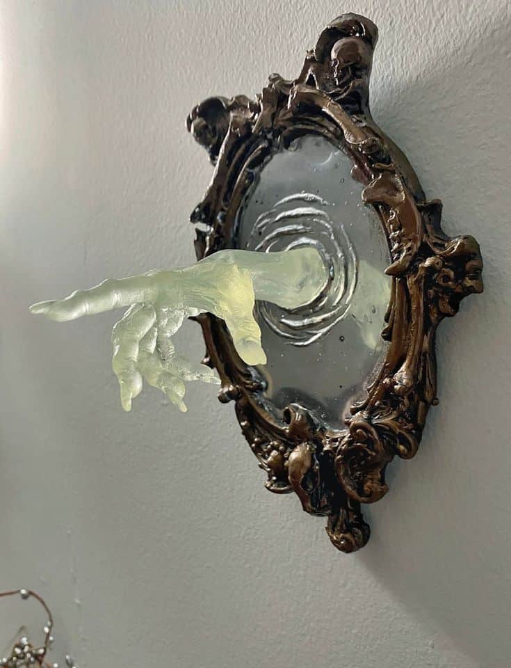 This decorative wall mirror features an elaborately carved, antique-style frame with gothic-inspired… — 3D model
