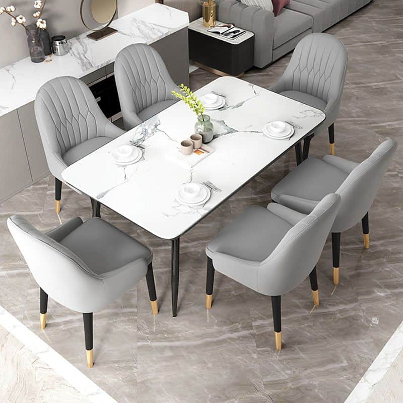 A modern dining set consisting of a rectangular table with a white marble-patterned top and six grey… — 3D model