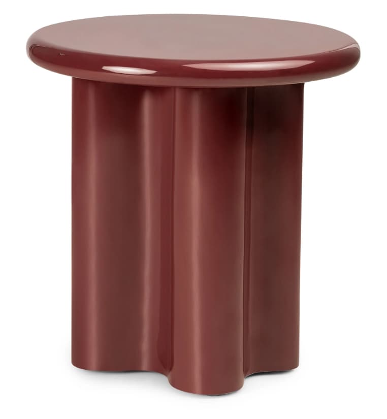 A modern, glossy reddish-brown side table featuring a round top with a thick, rounded edge. The base is a single, substantial pedestal with a distinctive vertical fluted or scalloped design, giving it a sculptural appearance. The table exhibits a smooth, reflective, high-gloss finish. — 3D model
