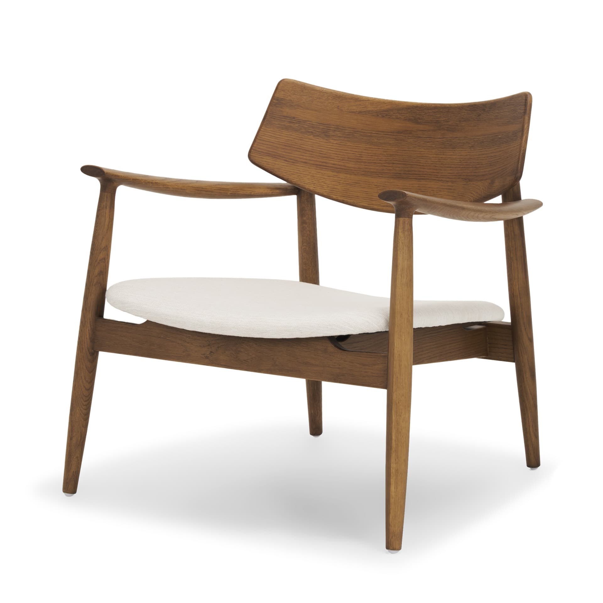 A classic Mid-Century Modern armchair featuring a gracefully curved wooden backrest and integrated armrests. The frame is constructed from a medium brown wood, possibly teak or walnut, with tapered legs. The seat is a removable cushion upholstered in a light, off-white fabric. — 3D model