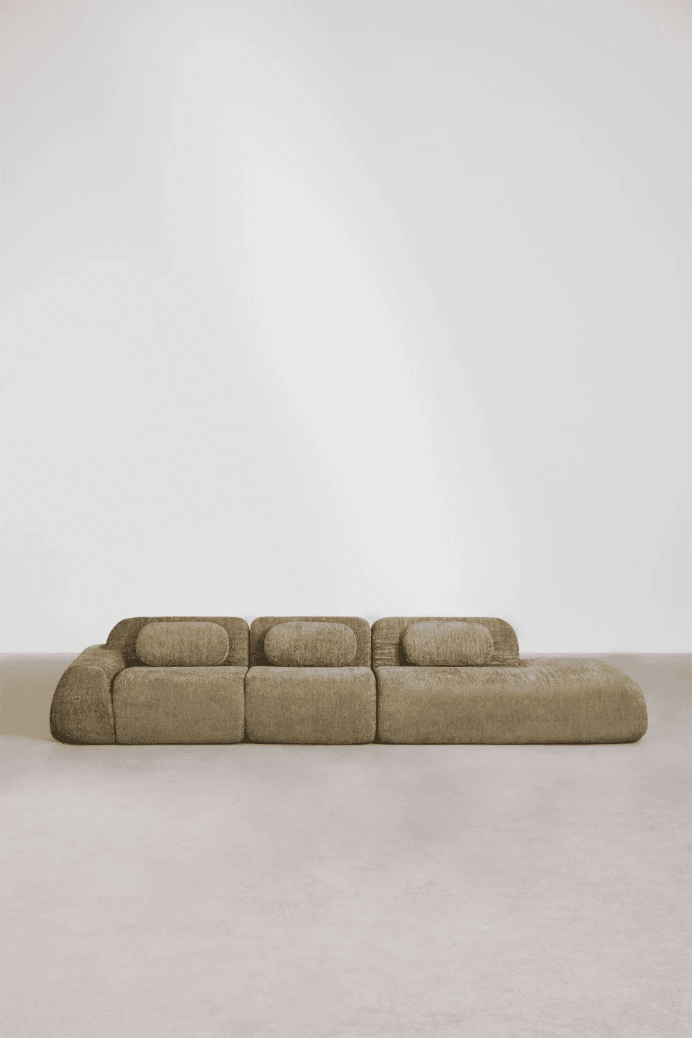 A low-profile contemporary sectional sofa with a chaise extension, upholstered in a textured, possib… — 3D model