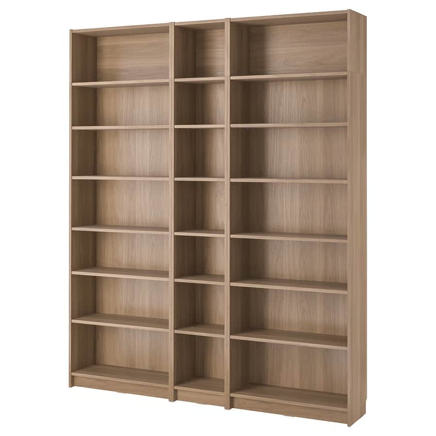 A tall, modular bookcase unit composed of three vertical sections. The leftmost section is wider and… — 3D model