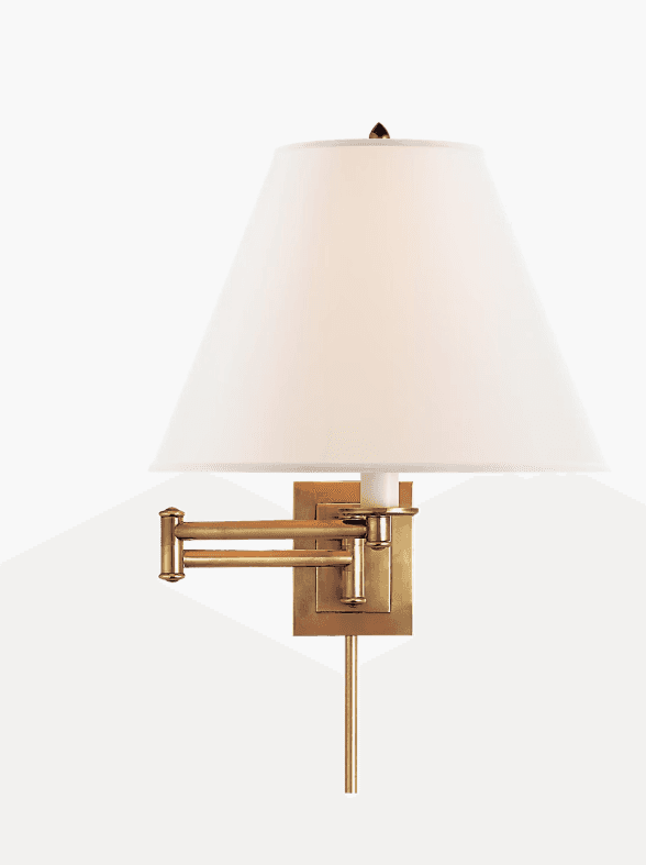 A swing-arm wall lamp with a conical, off-white fabric shade. The lamp features a brass-finished met… — 3D model