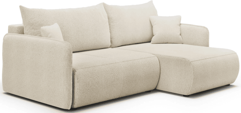 A modular chaise sofa with clean lines and upholstered in a textured, light beige fabric. It features a low profile with rounded edges on the chaise section and squared-off arms. The sofa includes multiple loose back cushions and one smaller accent cushion. The stitching is visible and follows the contours of the furniture. It is supported by small, dark feet. — 3D model