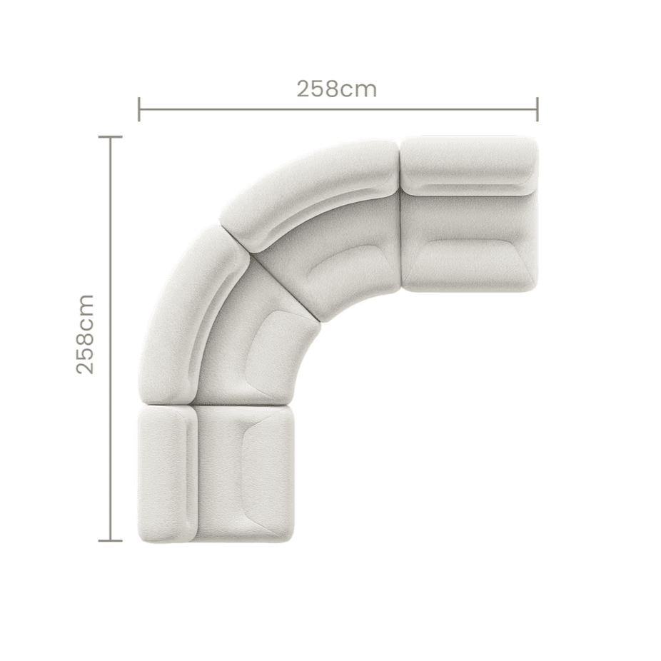 An overhead view of a modular L-shaped sectional sofa, composed of several upholstered units. The sofa features soft, rounded forms and is covered in a light-colored, textured fabric. — 3D model