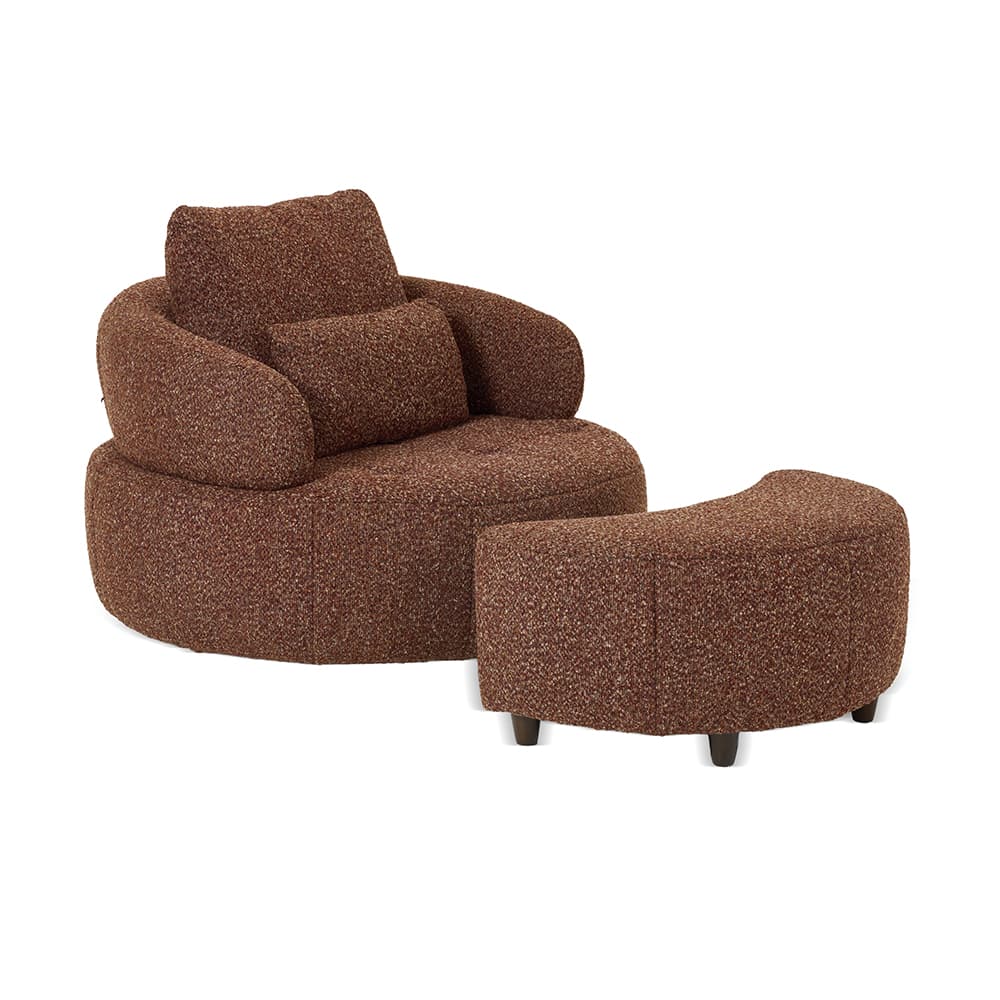 A rounded, upholstered armchair with a matching ottoman. The armchair features plush, oversized cushions and curved arms. The ottoman is low-profile with a rounded, ergonomic shape. Both pieces are covered in a textured fabric. — 3D model
