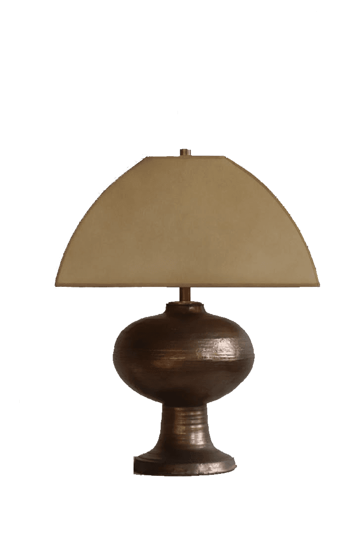A table lamp with a distinctive sculptural base and a semi-circular lampshade. The base is bulbous and rounded, tapering down to a flared pedestal. The lampshade has a curved, dome-like form and appears to be made of fabric. The overall design suggests a modern or transitional style. — 3D model
