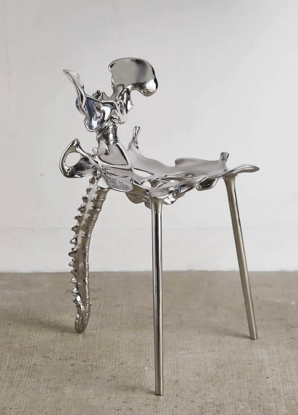 A unique chair with a design inspired by skeletal anatomy. The seat and backrest appear to be sculpt… — free STL 3D model