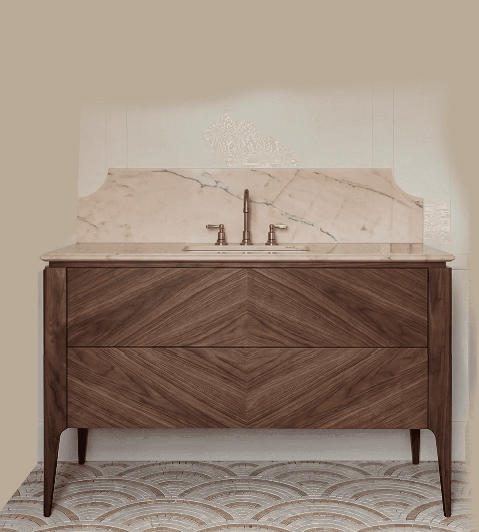 A contemporary bathroom vanity featuring a dark walnut wood cabinet, a light marble countertop with an integrated undermount sink, and a decorative marble backsplash. The cabinet displays a distinct chevron wood grain pattern on its two drawer fronts and stands on four tapered, splayed legs. A three-piece brass faucet set completes the unit. — 3D model