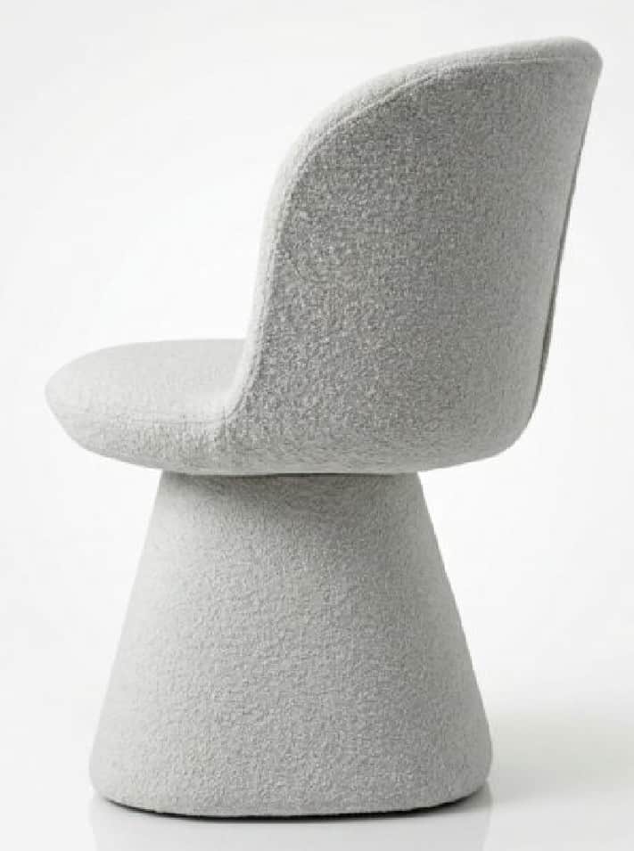 A modern upholstered chair featuring a single, tapered pedestal base and a curved, shell-like seat a… — 3D model