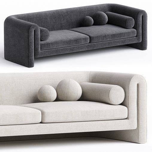 A contemporary sofa with a low profile and rounded armrests. The sofa features a modular design with distinct seat cushions and includes decorative bolsters and spherical throw pillows. The upholstery appears to be a textured fabric. — 3D model