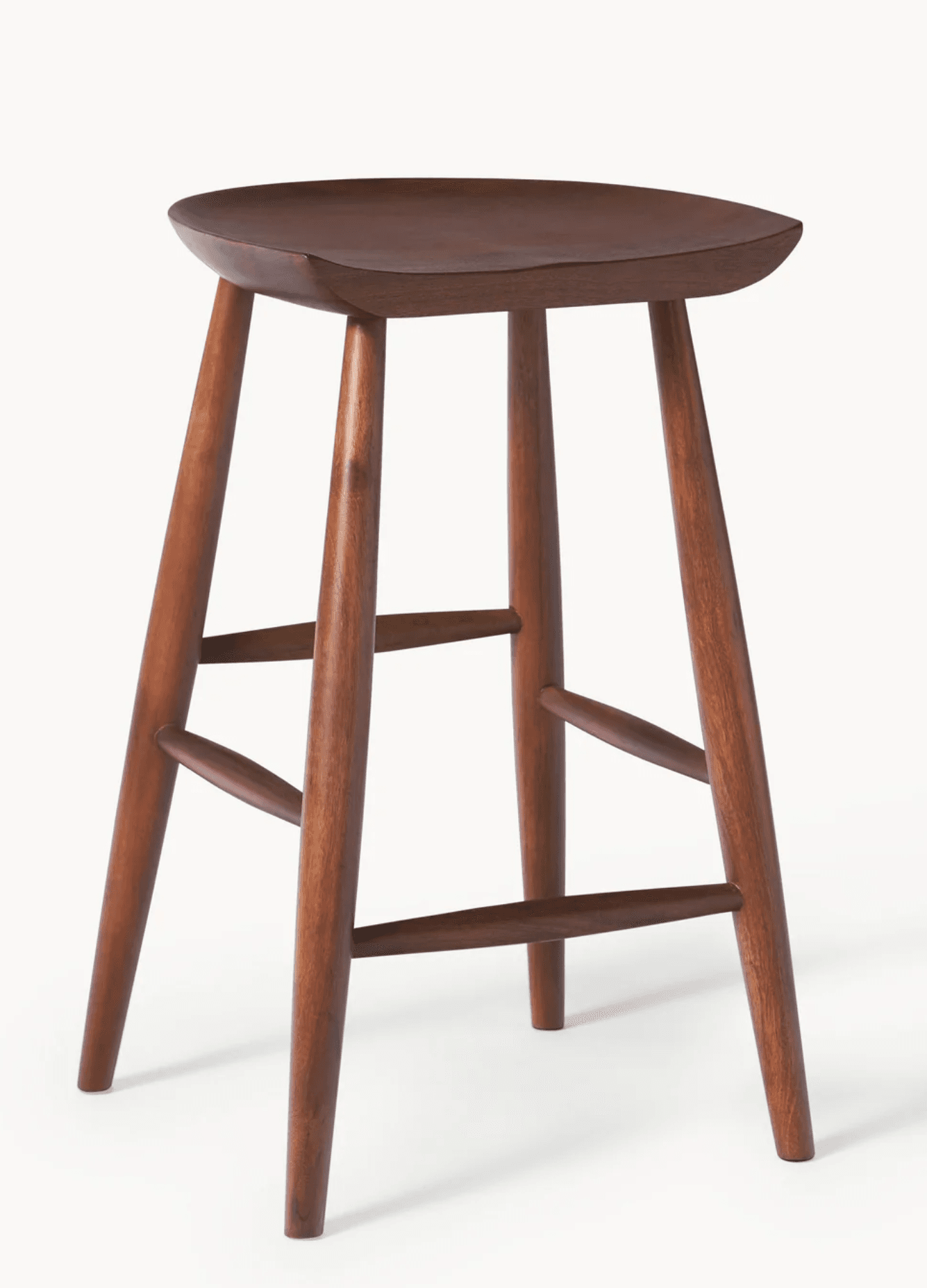 A dark reddish-brown wooden stool featuring a sculpted saddle-shaped seat. It stands on four splayed and tapered legs, reinforced by two sets of rounded stretchers that also serve as footrests. The wood grain is visible, suggesting solid wood construction with a polished finish. The design appears functional and minimalist. — 3D model