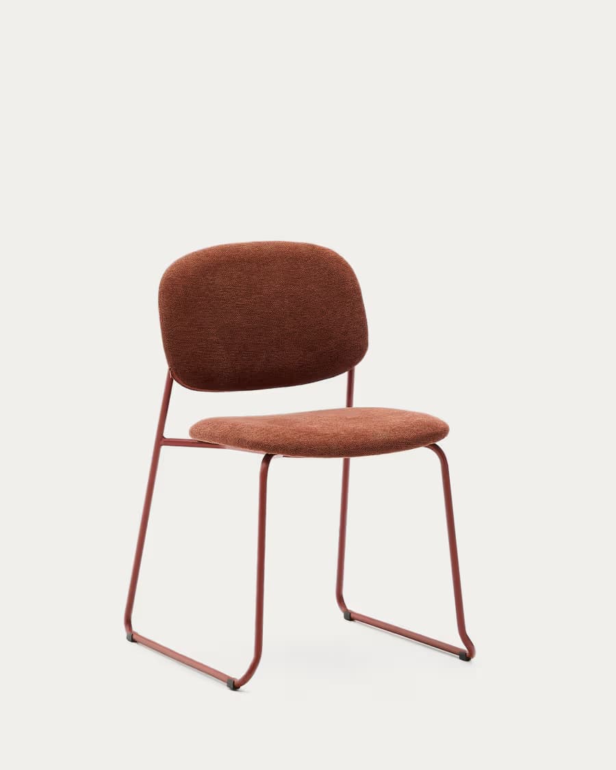 A modern side chair with a padded seat and backrest, supported by a slender metal frame. The chair features a curved, ergonomic back and a minimalist design. — 3D model