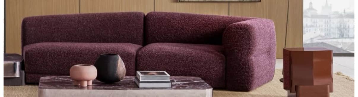 A contemporary modular sectional sofa featuring two interconnected units, one of which forms a chais… — 3D model