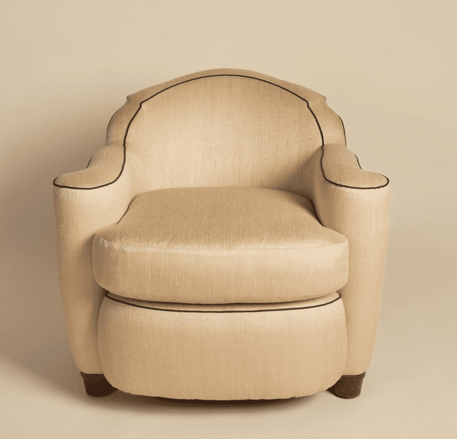An upholstered armchair featuring a rounded, club-style silhouette with prominent piping. The chair… — free OBJ 3D model