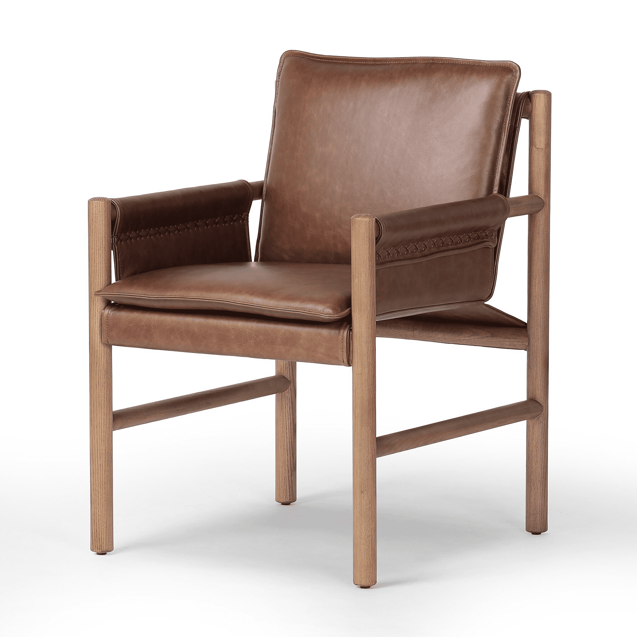 A contemporary armchair with a wooden frame and leather upholstery. The frame consists of four cylin… — 3D model