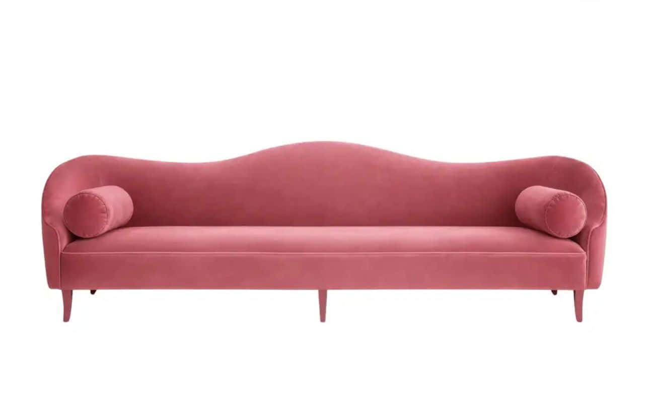 A pink velvet chaise lounge with a curved silhouette, featuring a low back that flows into an armres… — 3D model