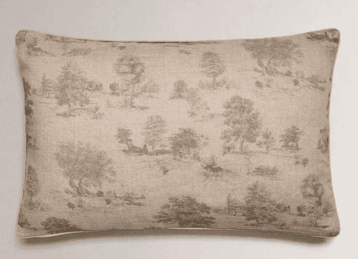 A rectangular cushion with a toile de Jouy-style print depicting a pastoral landscape with trees and… — 3D model