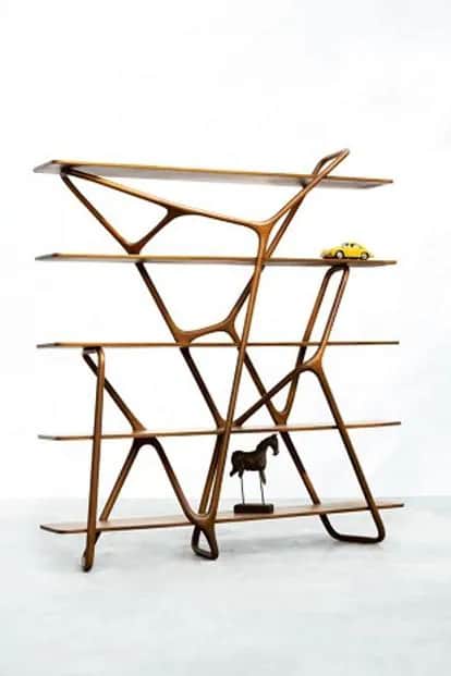 A modern, sculptural wooden shelving unit featuring a series of horizontally oriented shelves suppor… — free BLEND 3D model