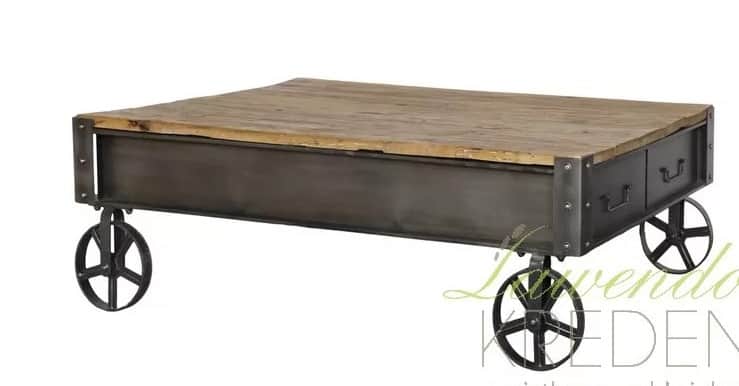 A rectangular coffee table featuring a rustic wooden top and a dark metal frame, supported by decora… — free GLB 3D model