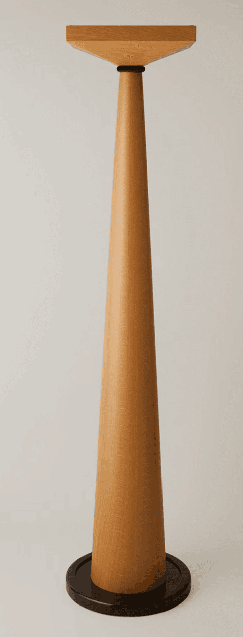 A tall, slender pedestal stand featuring a conical wooden body, a flat square top, and a dark circular base. — 3D model