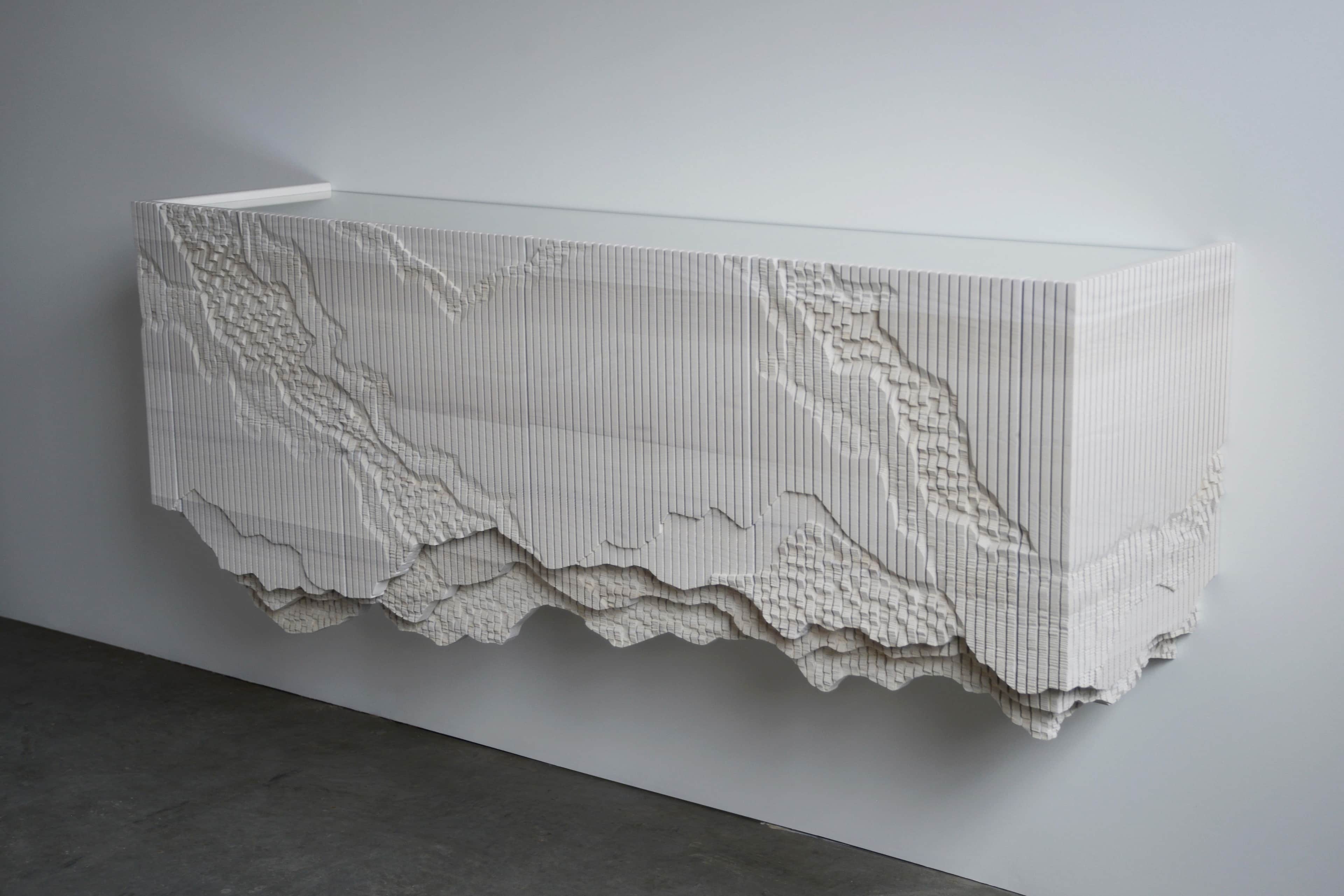 An elongated, rectangular console cabinet featuring a highly textured and sculptural facade and unde… — 3D model