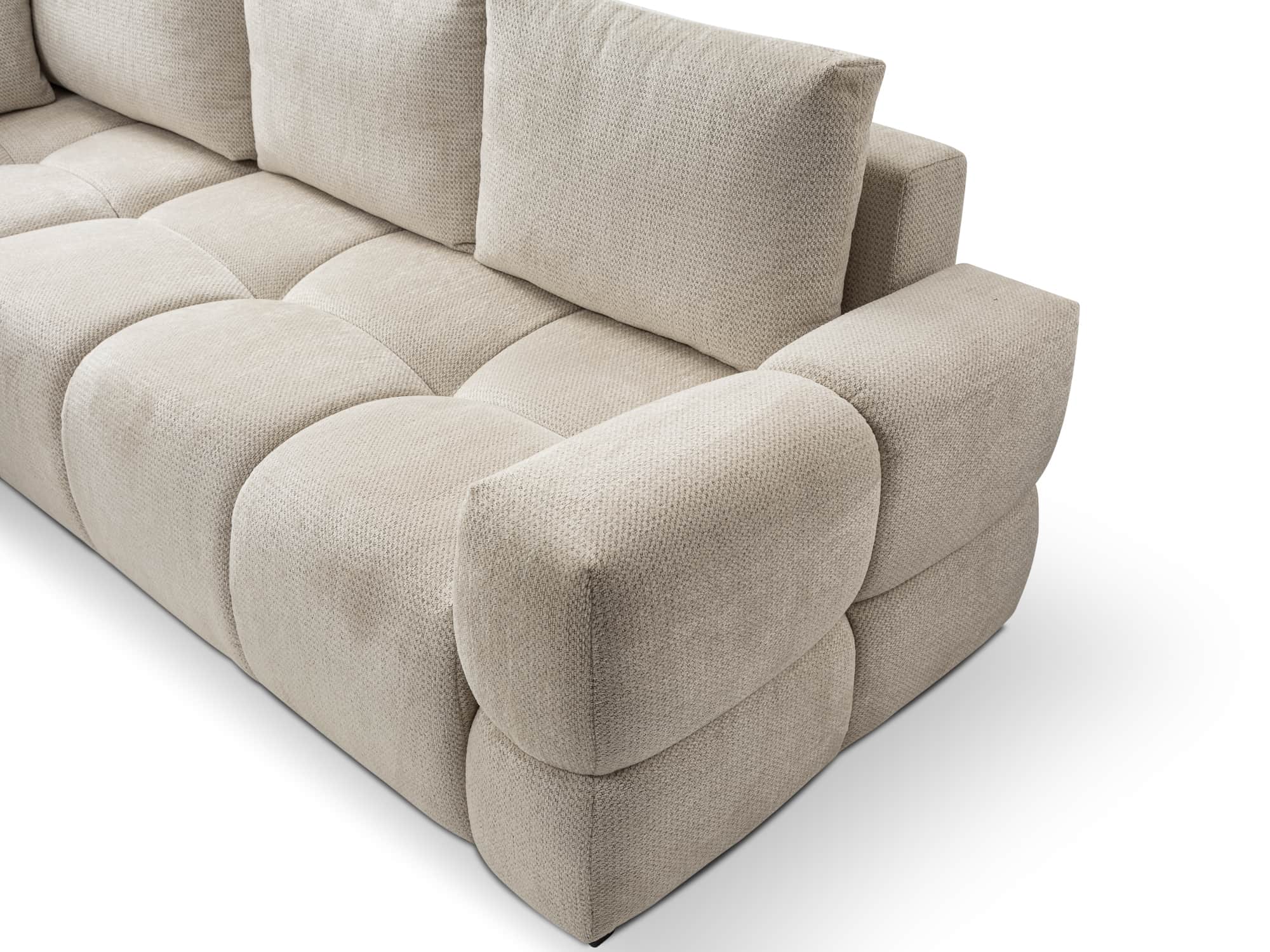 A modern modular sectional sofa upholstered in a light beige textured fabric. It features a deeply c… — 3D model