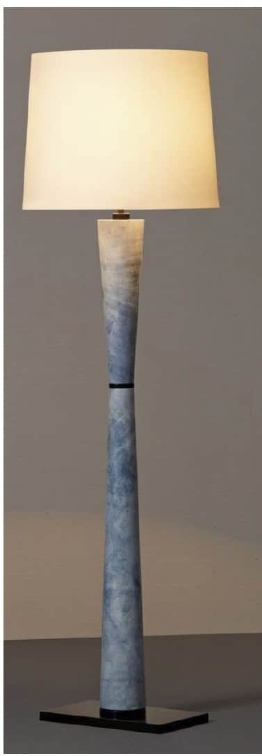 A floor lamp with a tapered, cylindrical body featuring a mottled blue and white pattern, reminiscen… — 3D model