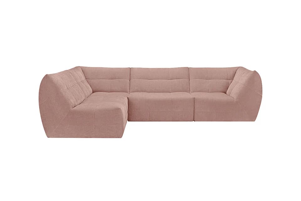 A modular sectional sofa with a low profile and plush upholstery. The sofa features a soft, textured fabric and deep tufting on the seat and back cushions, creating a modern, comfortable aesthetic. It is configured in an L-shape with distinct modular units. — 3D model