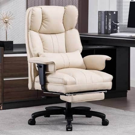 A modern high-back office chair upholstered in cream-colored padded faux leather, featuring adjustab… — 3D model