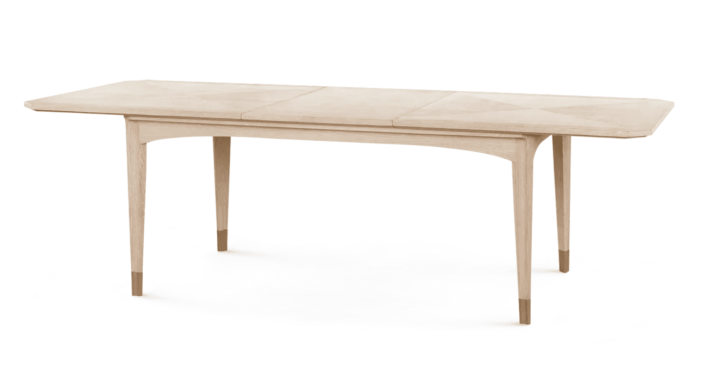 A light-colored wooden extendable dining table featuring a rectangular top with integrated leaves, supported by four tapered legs. The legs are subtly angled, and the base of each leg is adorned with a brass cap, adding a touch of elegance. The wood grain is visible, suggesting a natural finish. — 3D model