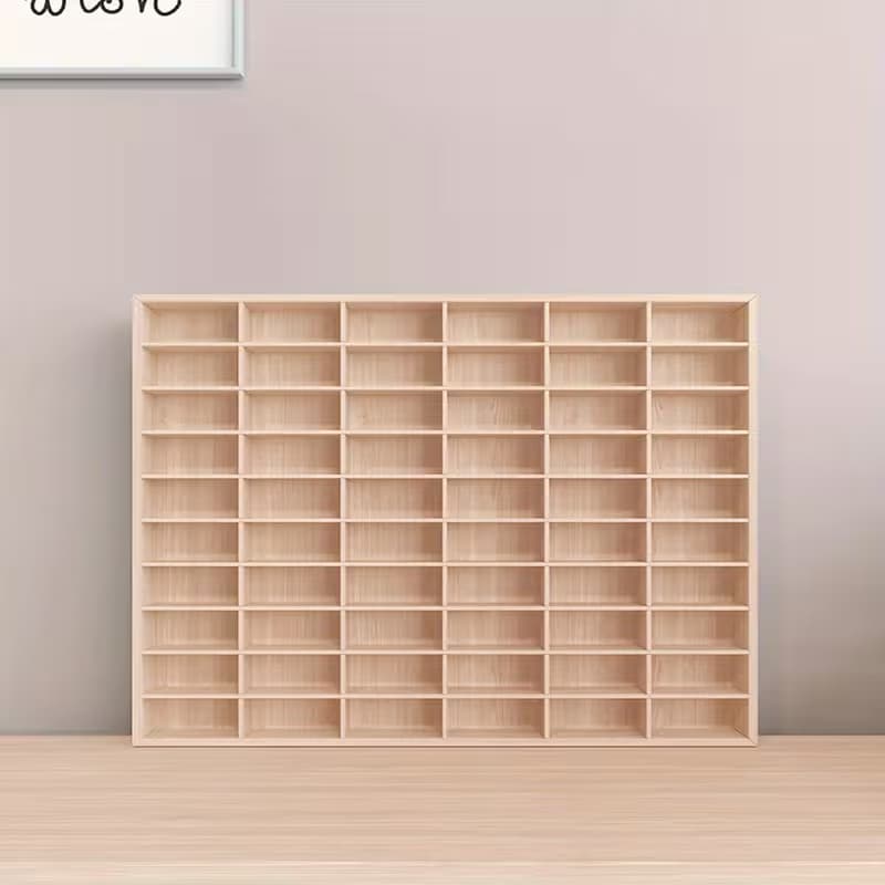 A light wood modular storage unit featuring 35 open square cubby compartments arranged in a 7x5 grid. — 3D model