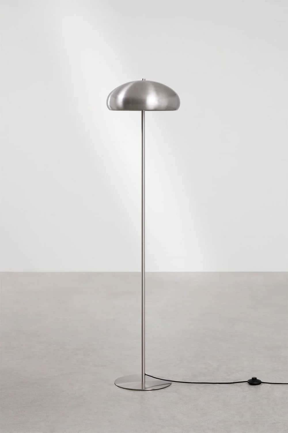 A contemporary floor lamp with a brushed metal finish. It features a circular base, a slender vertic… — 3D model