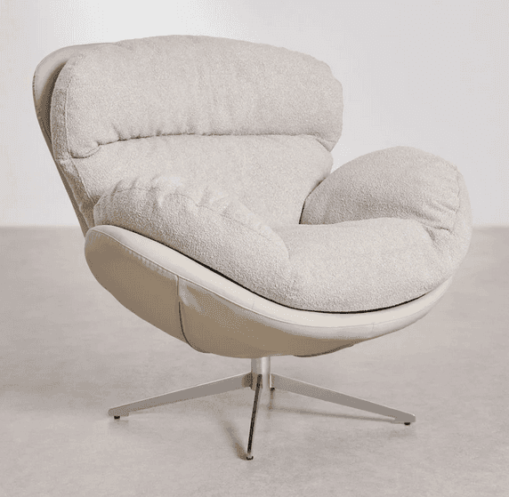 A plush, modern armchair with a distinctive pod-like silhouette. The chair features a high, envelopi… — 3D model