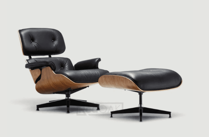 An iconic black leather and bent plywood lounge chair with a matching ottoman, characteristic of mid… — 3D model
