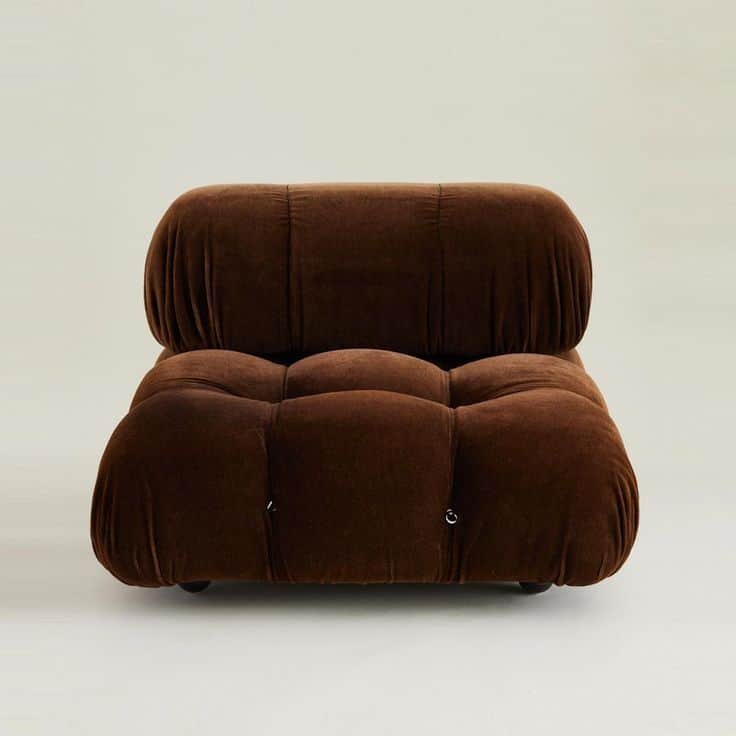 A modular armchair with a plush, tufted design upholstered in a dark brown velvet-like fabric. The a… — free OBJ 3D model
