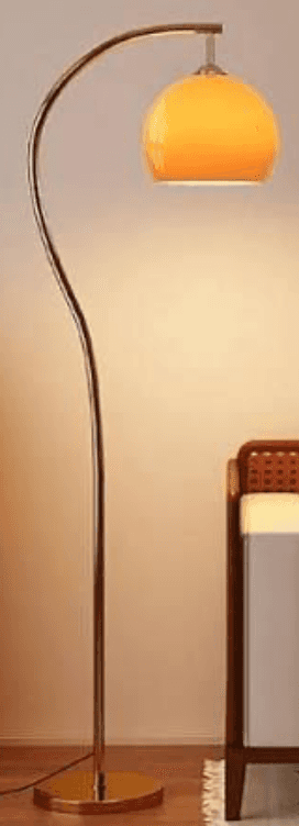 A modern arc floor lamp featuring a curved silver-toned metal stem, a round brushed metal base, and… — 3D model