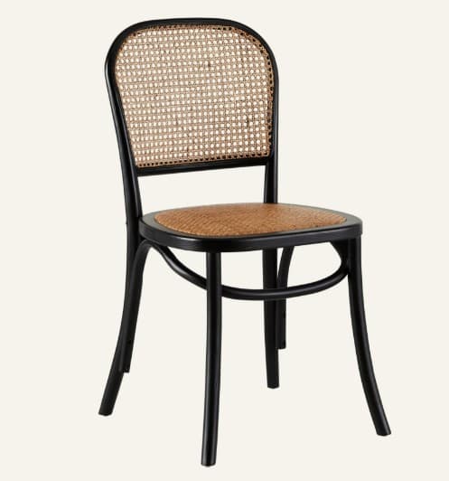 A black wooden dining chair featuring a rounded cane backrest and a woven cane seat. The frame exhibits classic bentwood construction with curved elements and four splayed legs. — 3D model