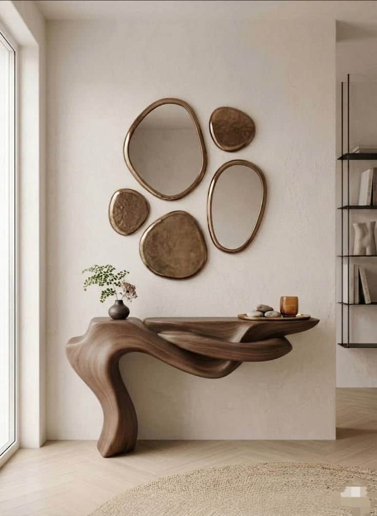 A unique sculptural wall-mounted console table crafted from dark brown walnut wood. Its design featu… — 3D model