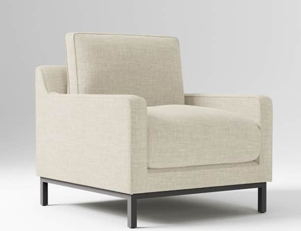 A modern armchair with a clean, boxy silhouette. The armchair features upholstered cushions for the… — 3D model