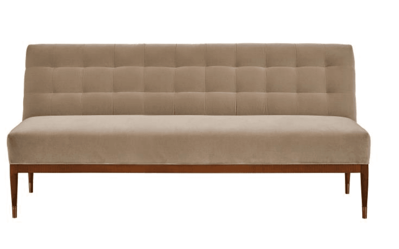 A contemporary sofa with a tufted backrest and a smooth seat cushion. The sofa features a wooden frame with four tapered legs, each accented with a brass cap. The upholstery appears to be a soft, plush fabric. — 3D model