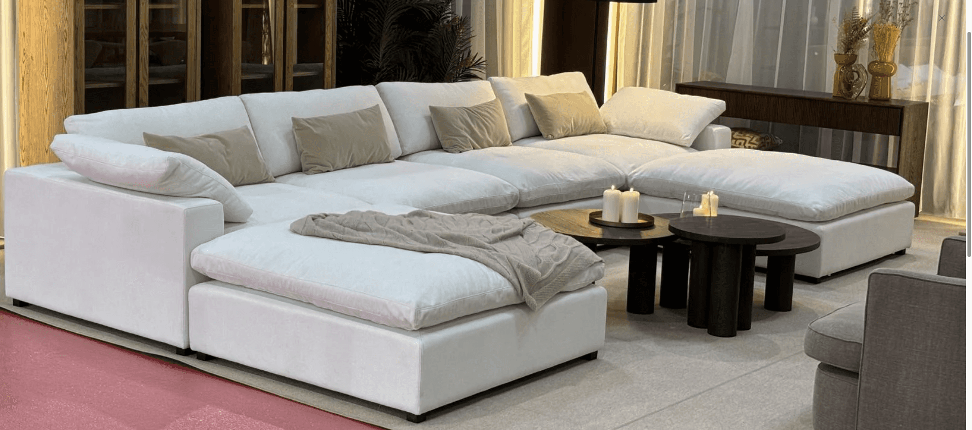 A modular sectional sofa with multiple seating components arranged in a U-shape. It features a low p… — free SKP 3D model
